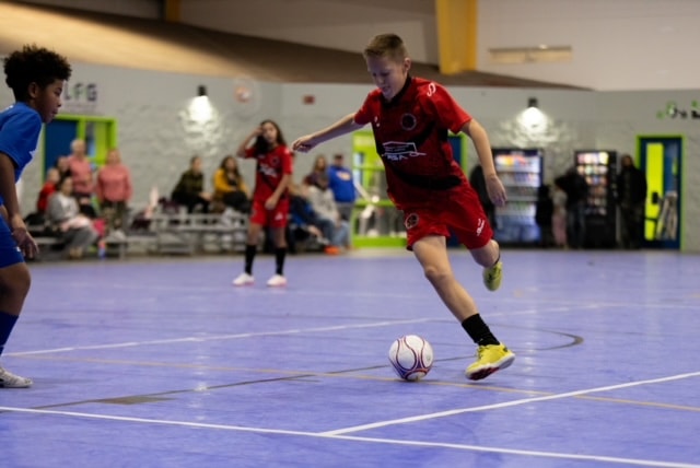 Academy match — indoor arena